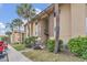 Condo building entrance with landscaping at 570 Orange Dr # 54, Altamonte Springs, FL 32701