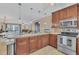 Updated kitchen with stainless steel appliances and breakfast bar at 570 Orange Dr # 54, Altamonte Springs, FL 32701