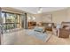 Living room with access to balcony and water views at 570 Orange Dr # 54, Altamonte Springs, FL 32701