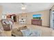 Living room features open floor plan with kitchen view at 570 Orange Dr # 54, Altamonte Springs, FL 32701