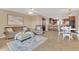 Open concept living room, kitchen, and dining area at 570 Orange Dr # 54, Altamonte Springs, FL 32701