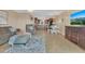 Spacious living area with open kitchen and tile flooring at 570 Orange Dr # 54, Altamonte Springs, FL 32701