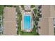 Top-down view of community pool and surrounding patio at 570 Orange Dr # 54, Altamonte Springs, FL 32701