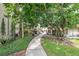 Landscaped walkway through condo complex at 570 Orange Dr # 54, Altamonte Springs, FL 32701