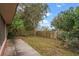 Home with deck and fenced-in backyard featuring lush landscaping at 603 14Th Ne St, Winter Haven, FL 33881