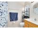 Clean bathroom with shower, vanity, and storage at 719 Dawson Ave, Orlando, FL 32825