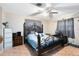 Spacious bedroom with a large bed and ample closet space at 719 Dawson Ave, Orlando, FL 32825