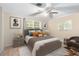 Main bedroom with plush bedding and large windows at 719 Dawson Ave, Orlando, FL 32825