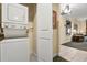 Stackable washer and dryer in a small laundry closet at 7703 Heritage Crossing Way # 302, Reunion, FL 34747