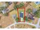 Aerial view of a well kept home and backyard with mature trees in a desirable neighborhood at 10339 Castillo Ct, Clermont, FL 34711