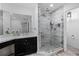 Modern bathroom with a glass-enclosed shower, vanity, and stylish fixtures at 10339 Castillo Ct, Clermont, FL 34711