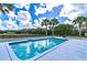 Relaxing pool area with a view of the surrounding landscape at 10901 Ne 36Th Ave, Anthony, FL 32617