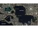 An aerial view of a home near Lake Down with canal access and a nearby boat launch at 11036 Schooner Way, Windermere, FL 34786