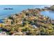 Aerial view of estate with private dock & canal access to Lake Down; waterfront living in a luxurious setting at 11036 Schooner Way, Windermere, FL 34786