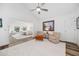 Bright bedroom with a vaulted ceiling, neutral decor, and an open layout into an adjoining sitting area at 11036 Schooner Way, Windermere, FL 34786