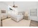 Spacious bedroom with vaulted ceiling, lots of light, and tasteful decor to create a relaxing atmosphere at 11036 Schooner Way, Windermere, FL 34786