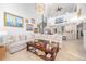 Spacious living room featuring elegant decor, and an open layout connecting to the kitchen and dining area at 11036 Schooner Way, Windermere, FL 34786