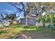 House exterior and large backyard with trees at 1246 Margina Ave, Daytona Beach, FL 32114