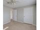 Bright bedroom with ceiling fan and neutral walls at 1246 Margina Ave, Daytona Beach, FL 32114