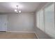 Bright dining room with neutral walls and carpet at 1246 Margina Ave, Daytona Beach, FL 32114