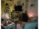 Cozy living room with Christmas tree, decorated console, and neutral furniture at 1517 Lancashire Way, Deland, FL 32720