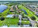 Community overview, including pool, golf course, and lake at 15503 Amberbeam Blvd, Winter Garden, FL 34787