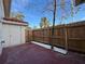 Small, private backyard with wood fence and gravel at 1627 Eagle Creek Cir # 36, Orlando, FL 32807