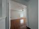 View of a bedroom with wood flooring and a window at 1627 Eagle Creek Cir # 36, Orlando, FL 32807