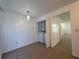Small laundry room with washer and dryer hookups at 1627 Eagle Creek Cir # 36, Orlando, FL 32807