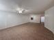 Spacious living room with tile floors and a ceiling fan at 1627 Eagle Creek Cir # 36, Orlando, FL 32807