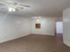 Bright living room featuring tile floors and a staircase at 1627 Eagle Creek Cir # 36, Orlando, FL 32807