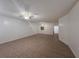 Spacious living room with tile floors and a ceiling fan at 1627 Eagle Creek Cir # 36, Orlando, FL 32807