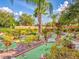 Landscaped putting green with winding pathways at 164 Sevilla Ave, Davenport, FL 33897