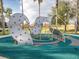 Community playground with climbing wall and play structures at 164 Sevilla Ave, Davenport, FL 33897