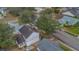 Aerial view of the home's rear, highlighting its size and backyard at 16946 Woodcrest Way, Clermont, FL 34714