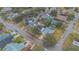 Aerial view showcasing the home's setting within a residential area at 16946 Woodcrest Way, Clermont, FL 34714