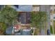 Overhead view of house and surrounding area at 16946 Woodcrest Way, Clermont, FL 34714