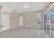 Dining area with tiled floors, sliding doors, and access to the backyard at 16946 Woodcrest Way, Clermont, FL 34714