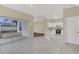 Kitchen with white cabinets and stainless steel appliances at 16946 Woodcrest Way, Clermont, FL 34714