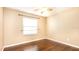 Bedroom with wood flooring and neutral walls at 1747 Lady Slipper Cir, Orlando, FL 32825