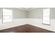 Bedroom with wood floors and wainscoting at 1747 Lady Slipper Cir, Orlando, FL 32825