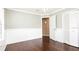 Bedroom with wood floors and built-in closet at 1747 Lady Slipper Cir, Orlando, FL 32825