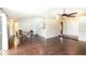 Spacious dining area with wood-look floors and a ceiling fan at 1747 Lady Slipper Cir, Orlando, FL 32825