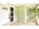 Inviting front porch with light green exterior and tiled flooring at 1747 Lady Slipper Cir, Orlando, FL 32825