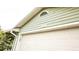 White attached garage door with house number 1747 at 1747 Lady Slipper Cir, Orlando, FL 32825