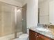 Bathroom with shower, granite vanity, and toilet at 211 Pendant Ct, Kissimmee, FL 34747