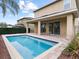 Private rectangular pool with brick patio at 211 Pendant Ct, Kissimmee, FL 34747