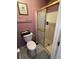 Bathroom with shower stall and white toilet at 2864 Copper Ridge Ct, Lake Mary, FL 32746