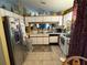 Kitchen features stainless steel appliances and white cabinets at 2864 Copper Ridge Ct, Lake Mary, FL 32746