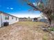 Large backyard with shed and mature tree at 2911 Dudley Dr, Bartow, FL 33830